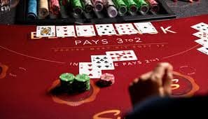 Live dealer Andar Bahar game streaming with real cards for authentic experience